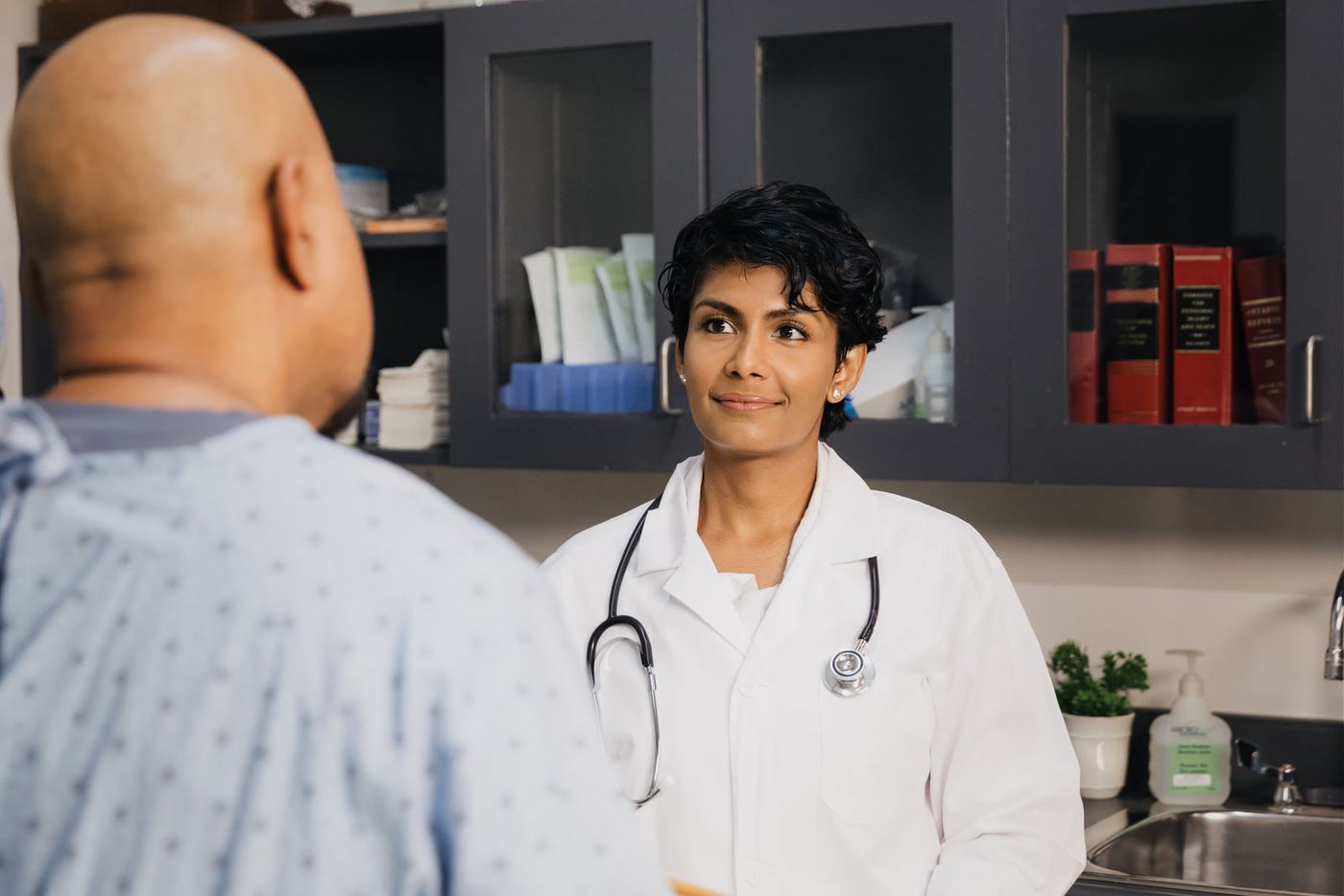A doctor talking with a patient in a clinic